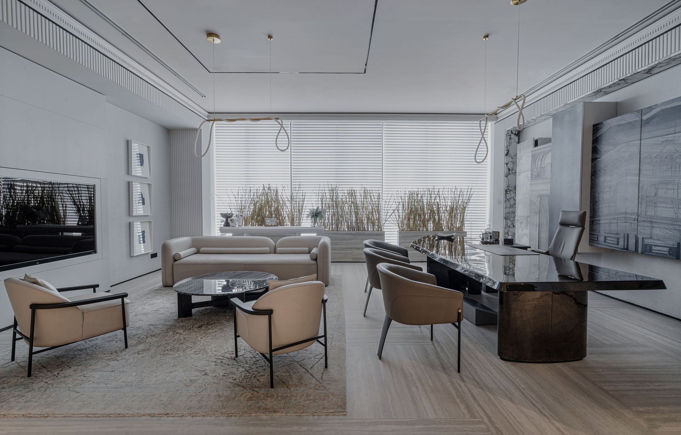 A calm, unoccupied executive lounge in soft daylight, furnished with restraint.